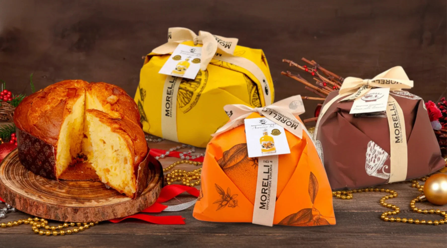 Panettones artisanaux Morelli emballés aux couleurs festives avec un panettone coupé en tranches – pâtisserie italienne traditionnelle de Toscane, photo EasyGusto.fr