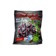 Sachet de bonbons réglisse Ambrosoli Fior di Liquirizia 150g, sans gluten, avec emballages individuels. Parfait pour les amateurs de bonbon réglisse, réglisse américain et carensac.
