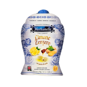 Bonbon Herbamelle au Miel, Gingembre et Citron, 75g, emballage coloré avec illustrations de fruits.