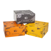 Ensemble de boîtes colorées de panettone artisanal avec différentes saveurs : Grappa, Arancino, et Limoncino, représentant la diversité de la gamme Morelli.