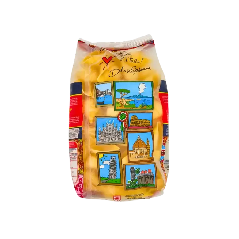 Dos du paquet de Conchiglioni Rigati 500g de Pastificio Di Martino, illustré avec des monuments italiens colorés et la signature Dolce & Gabbana