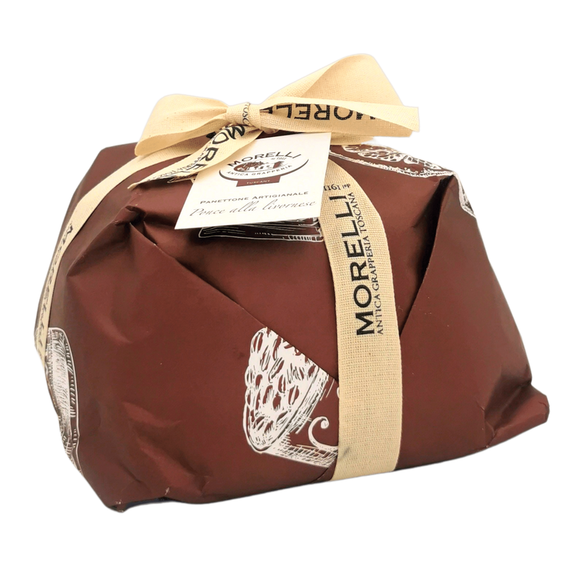 Panettone au chocolat noir Punch Livournais 750 g, emballé dans un papier brun avec ruban et étiquette « Tradition Toscane » visible.