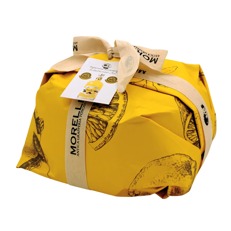Panettone au limoncello emballé dans un packaging jaune Morelli, mettant en valeur le savoir-faire artisanal italien avec citron sicilien et ingrédients toscans.